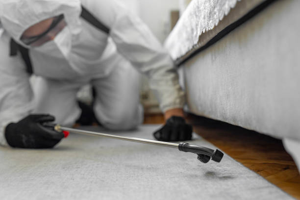 Professional Cockroach Control technician working in Newburgh, IN